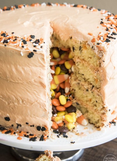 A side image of a halloween pinata cake showing the candy pouring out of the side of the cake.