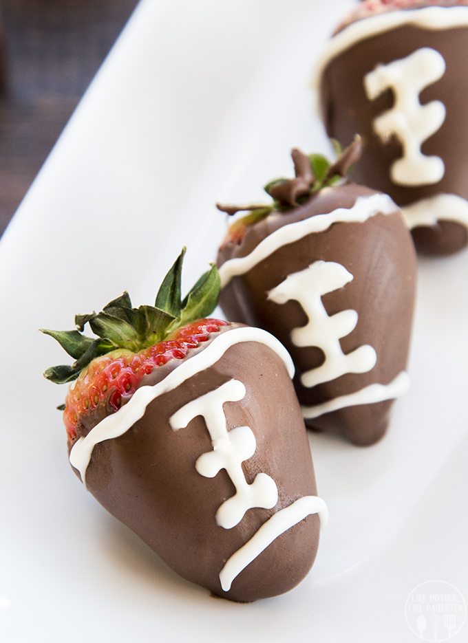 Football Chocolate Covered Strawberries are not only easy to make, they're also delicious to eat and so cute for a football watching party!
