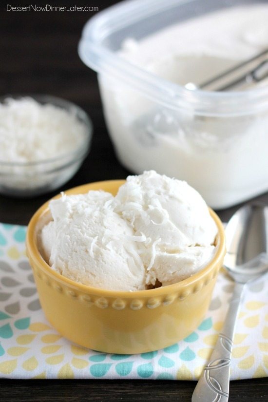 A yellow bowl full of coconut ice cream. 