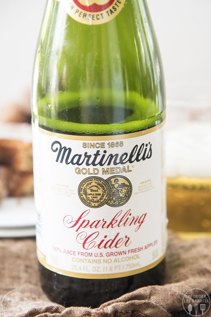 A close up of a bottle of Marinelli\'s Sparkling Cider. 