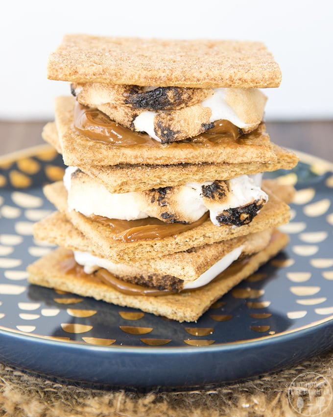 S\'mores made with cinnamon graham crackers and dulce de leche inside  them.