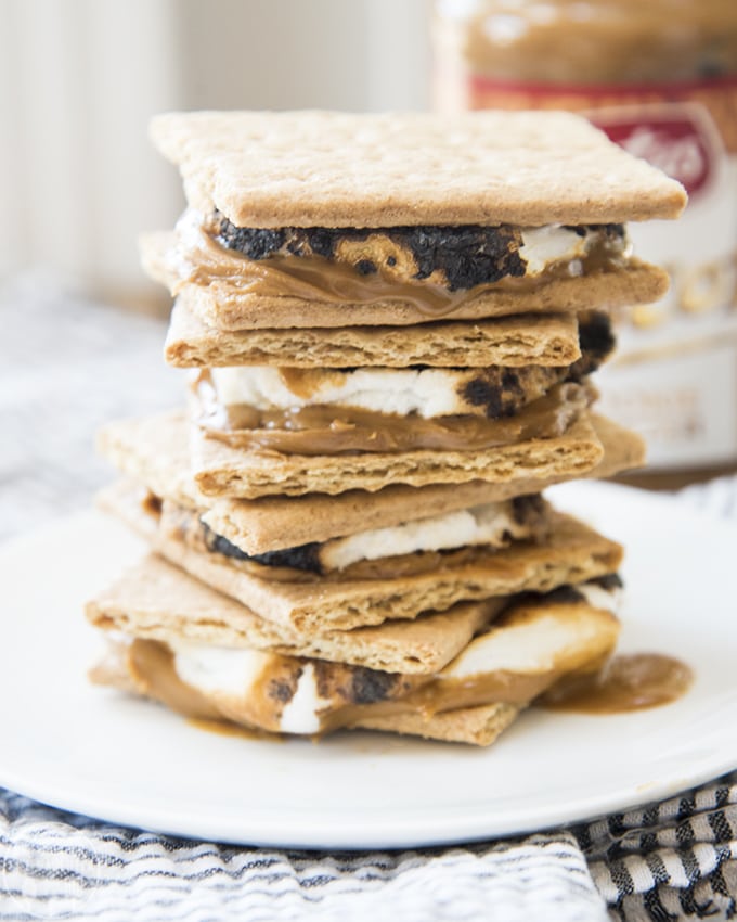A stack of s\'mores with a smear of cookie butter on each one. 