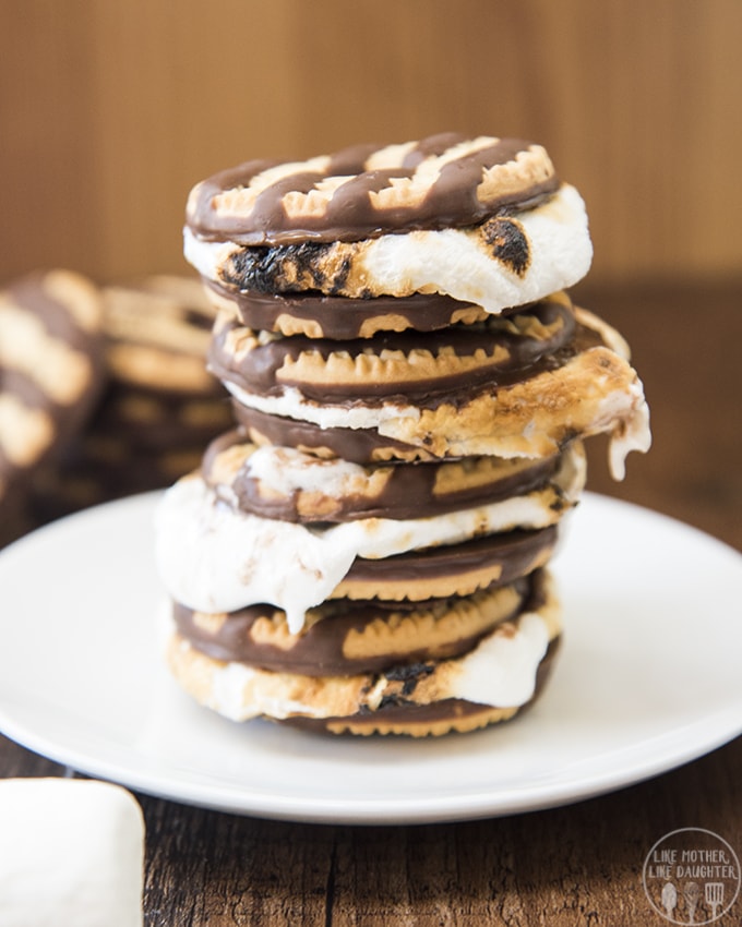 A stack of s\'mores made with fudge striped cookies instead of graham crackers. 