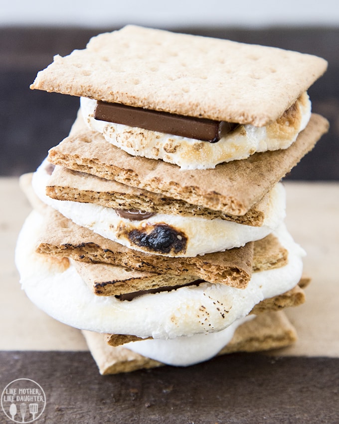 A stack of s\'mores with roasted marshmallows and chocolate. 