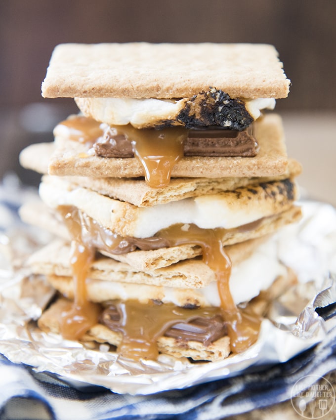 Salted Caramel s\'mores made with caramel chocolate in a stack on foil. 