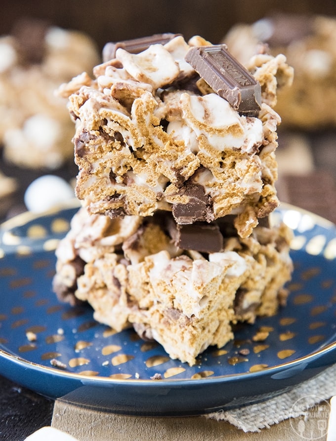 A stack of two rice krispies made with golden grahams and chocolate to make them like s'mores.
