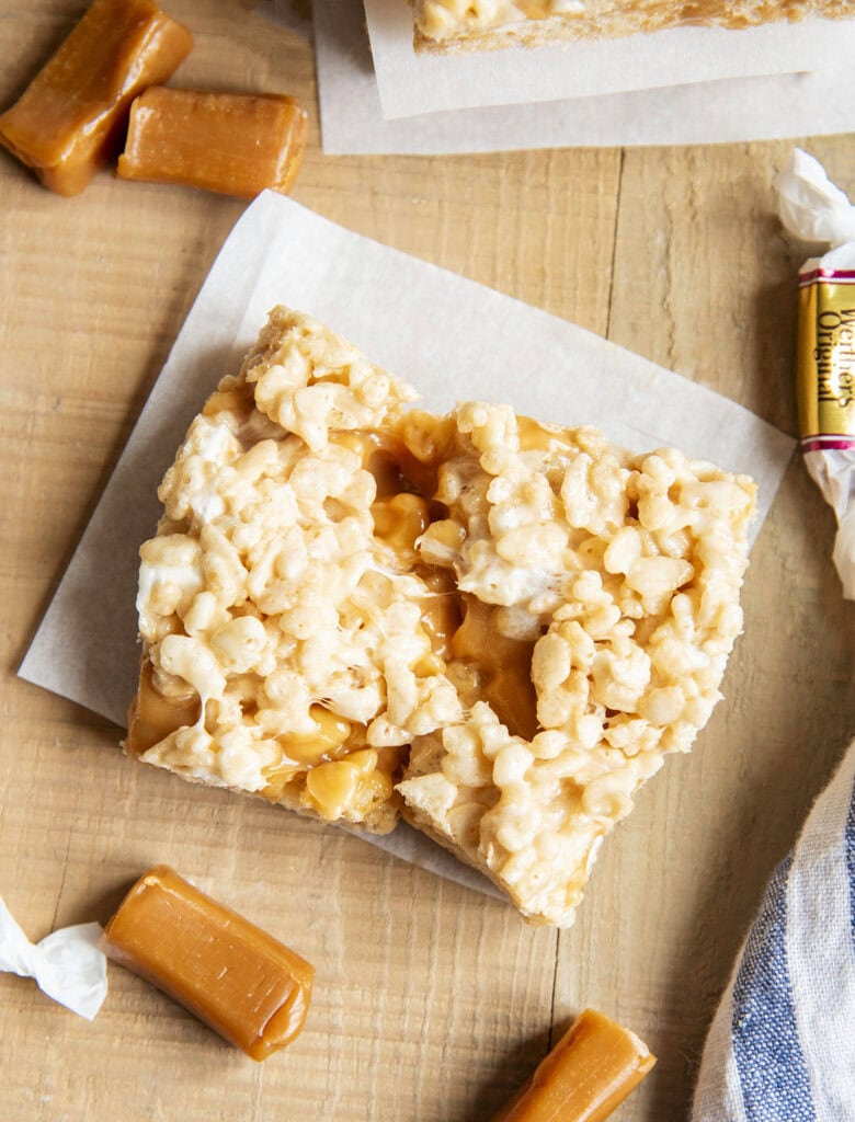 An above shot of a gooey rice krispie treat showing a center of caramel.