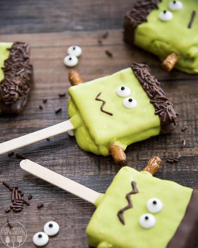 these cute smores pops are made to look like Frankenstein's monster - a perfect Halloween treat