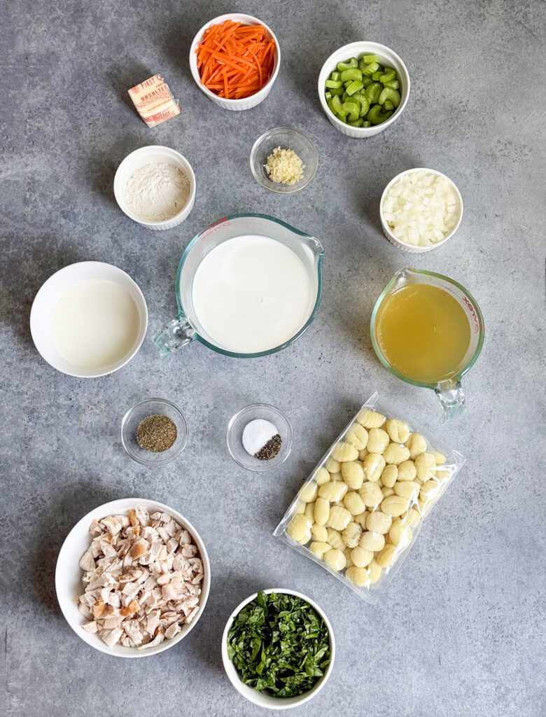 Small bowls of the ingredients needed to make Olive Garden chicken gnocchi soup.
