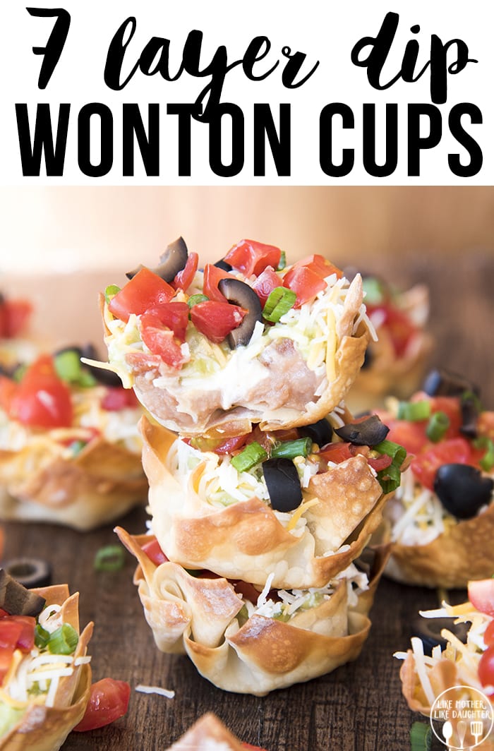A stack of wonton cups full of homemade 7 layer dip with a text overlay over the top. 