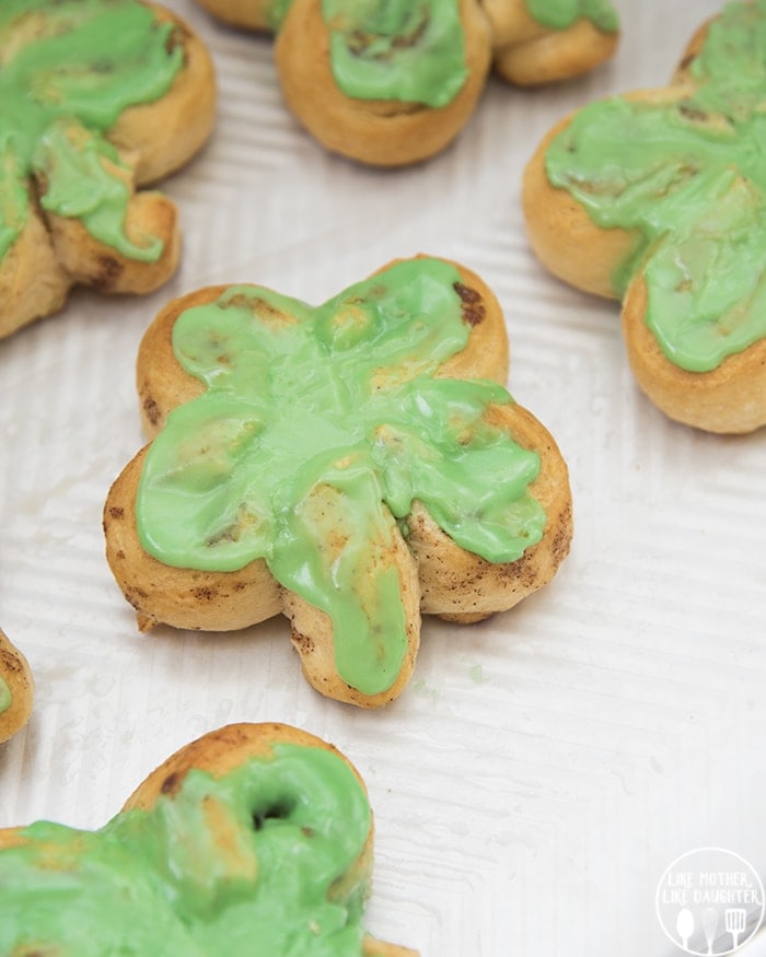 Green shamrock shaped cinnamon rolls.