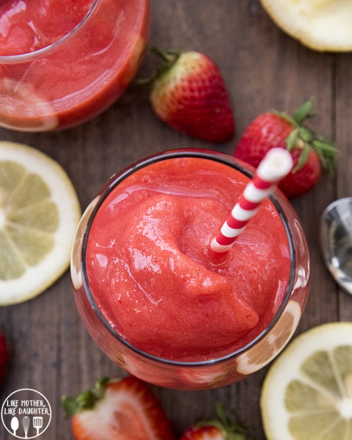 Frozen Strawberry Lemonade with a red and white straw