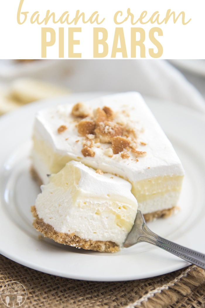A banana cream pie bar on a plate with a fork cutting a small piece out. 
