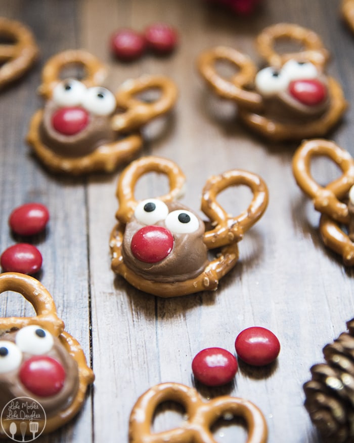 Pretzels topped with a rolo, m&m, and candy eyes to look like reindeer.