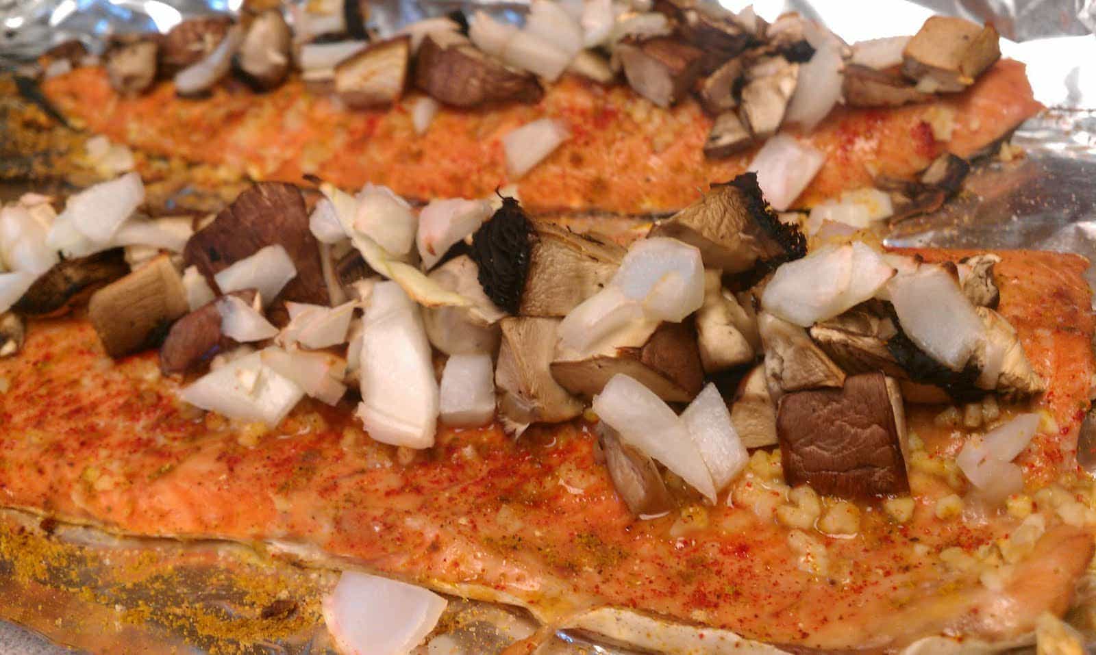 A savory and flavorful baked trout dish; flavored with lots of spices, onions, and mushrooms.