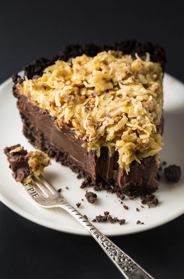A slice of chocolate pie topped with German chocolate frosting.