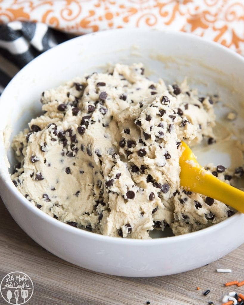 A bowl of edible cookie dough with mini chocolate chips. 