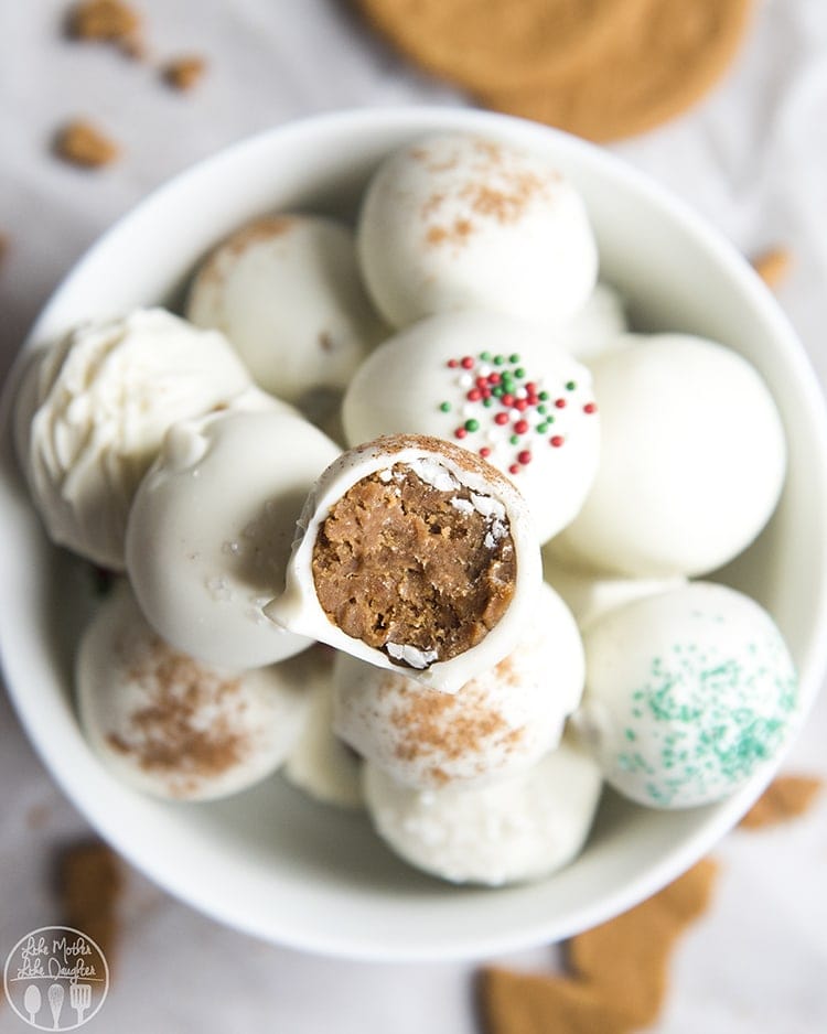 A bowl of gingerbread truffles dipped in white chocolate.