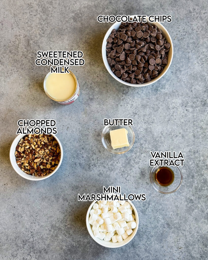 Small bowls of the ingredients needed to make rocky road fudge.