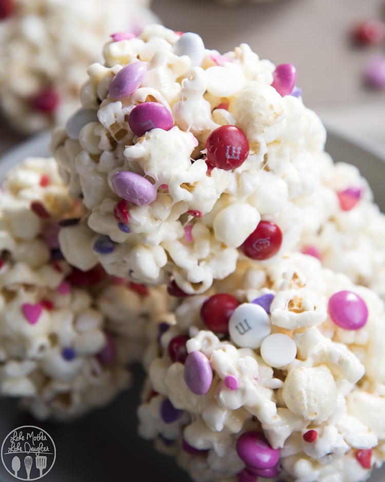Valentine's Day Popcorn Recipe rolled into cute handheld popcorn balls