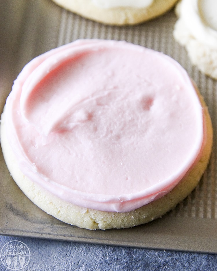 A pink frosted sugar cookie.
