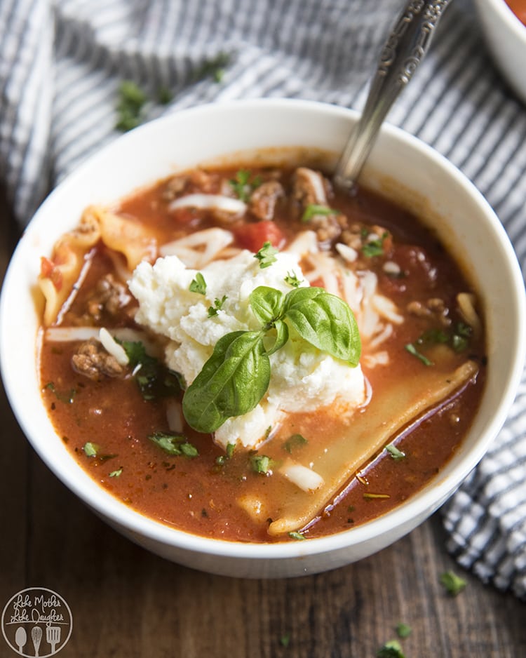 A bowl of one pot lasagna soup with a spoon in the bowl.