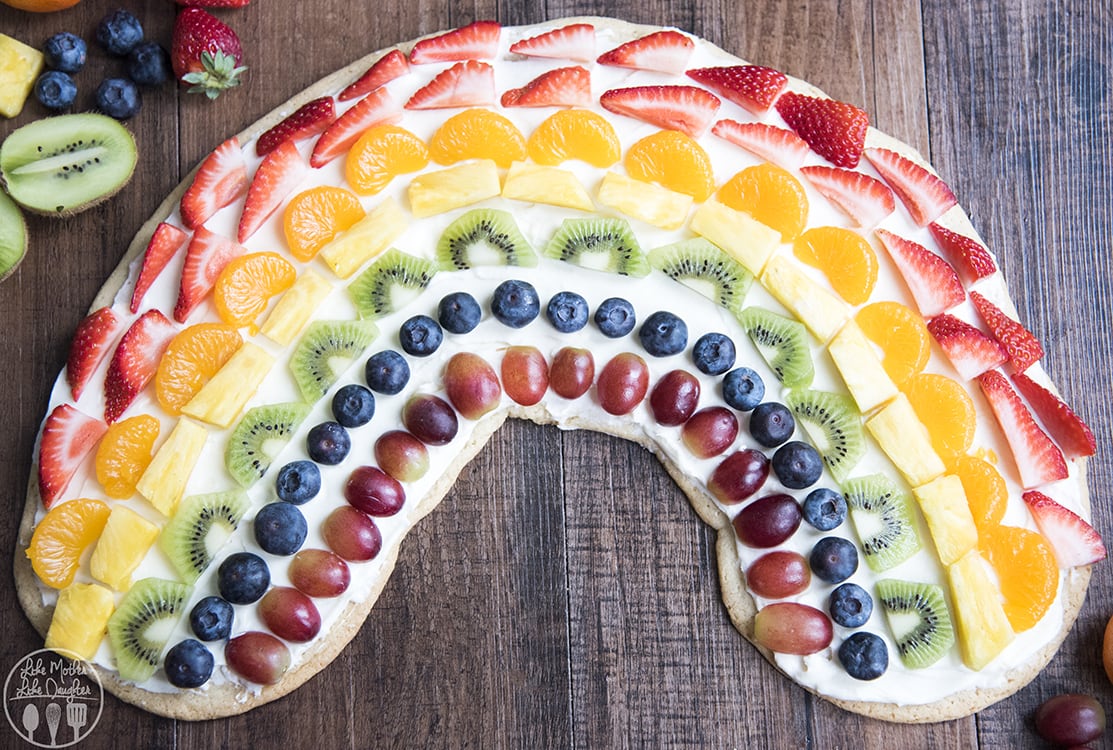 Sugar Cookie Fruit Pizza shaped like a rainbow
