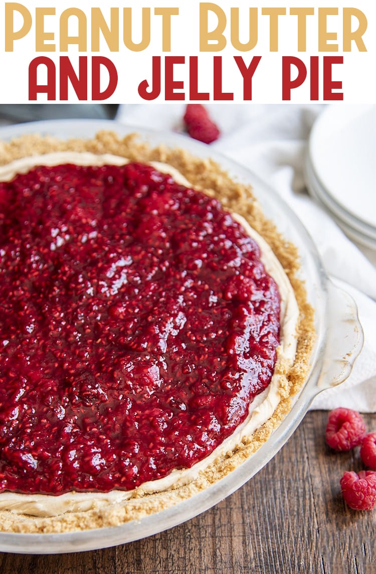 A peanut butter pie topped with raspberry sauce. 