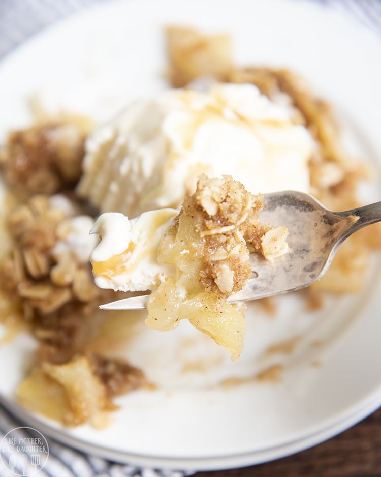 A forkful of apple crisp.