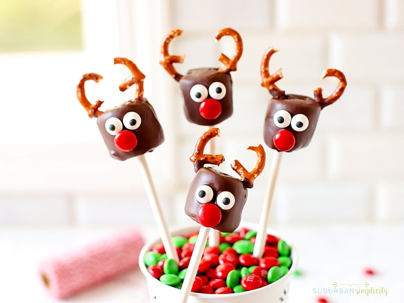 Marshmallows dipped in chocolate and decorated to look like reindeer. 
