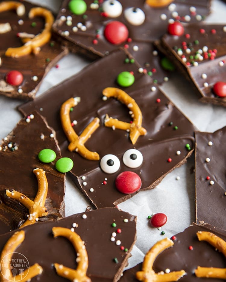 Chocolate bark decorated with pretzels and candies to look like reindeer. 