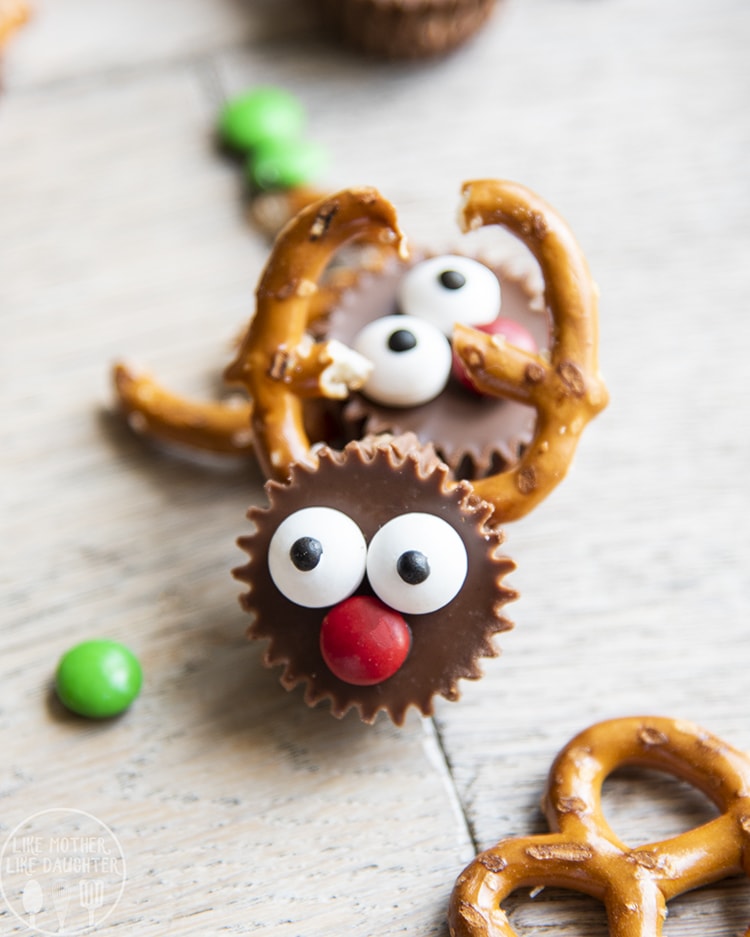 Reindeer Peanut Butter Cups with pretzel antlers