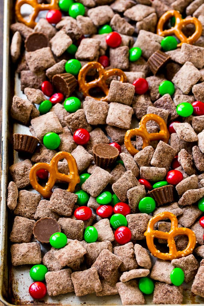 A chocolate chex mix with pretzels, and m&ms.