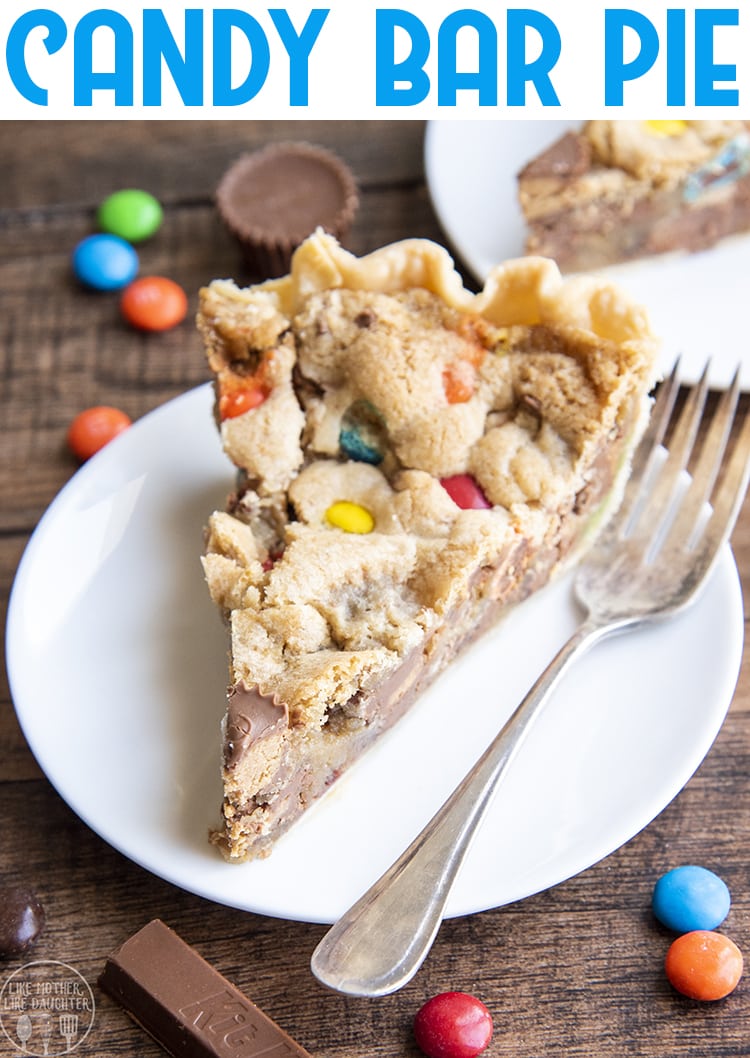 A piece of cookie pie full of candy pieces. 