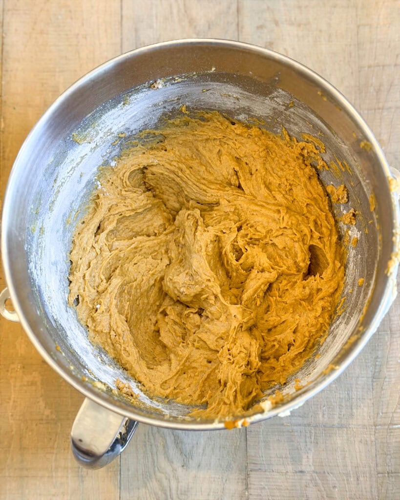 A bowl of pumpkin muffin batter.