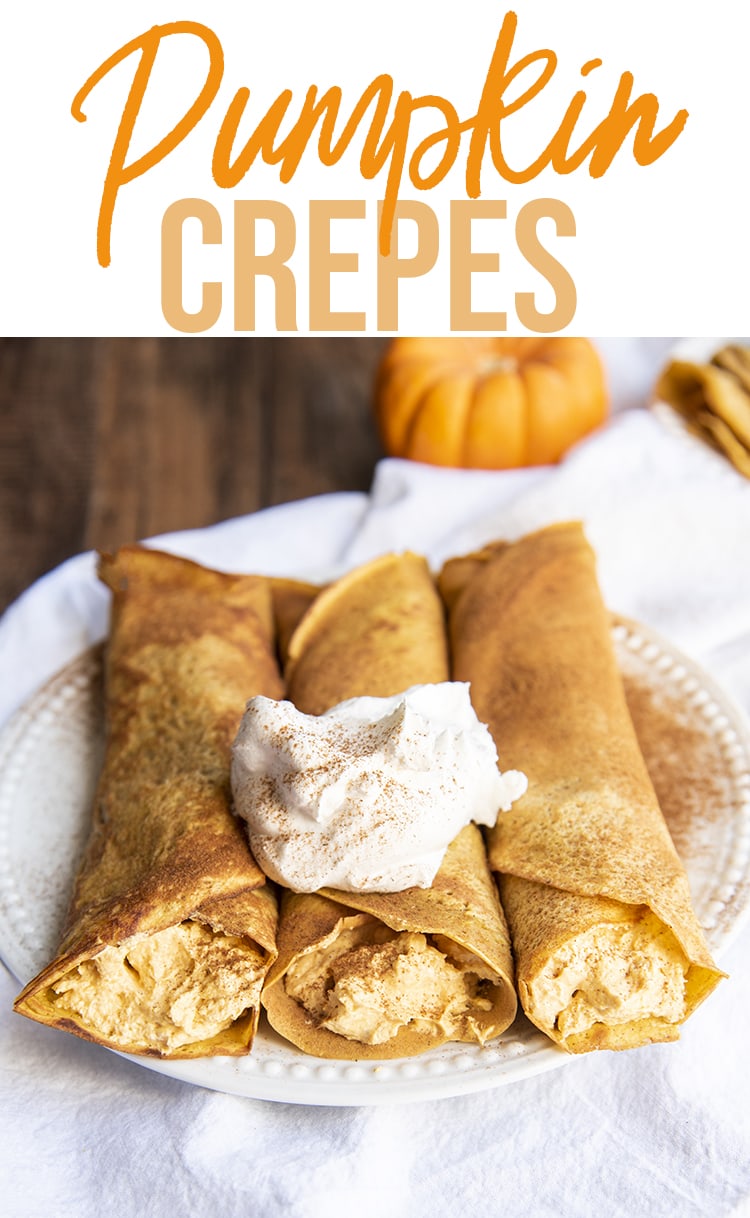 A plate of three rolled pumpkin crepes with pumpkin filling in the middle. 