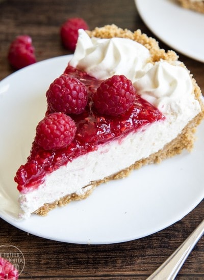 A slice of raspberry cream pie on a plate.