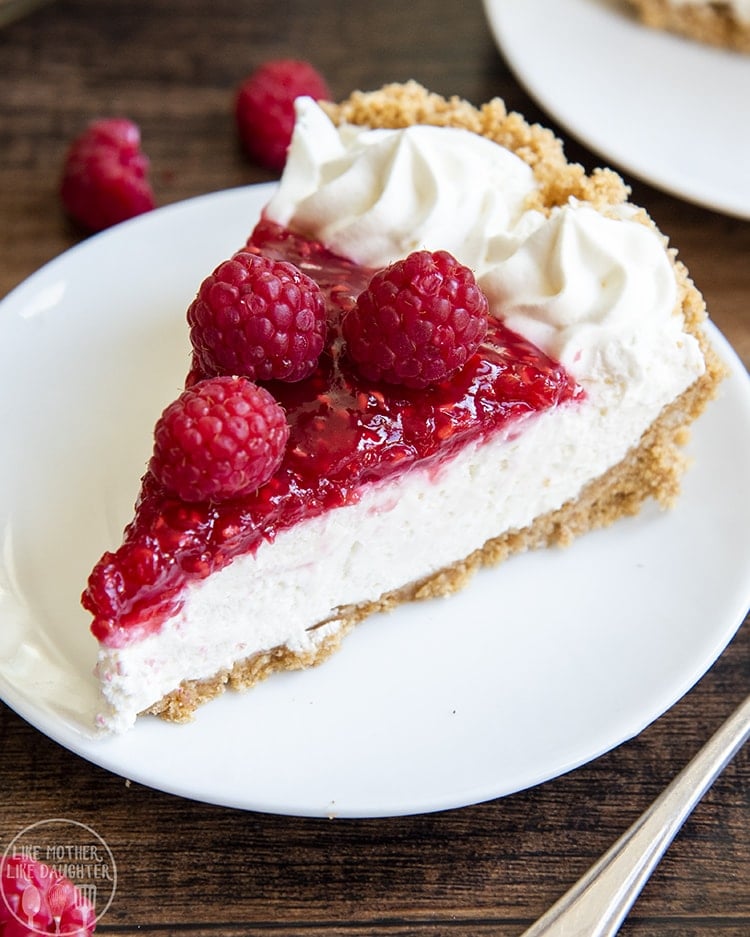 A slice of raspberry cream pie on a plate.
