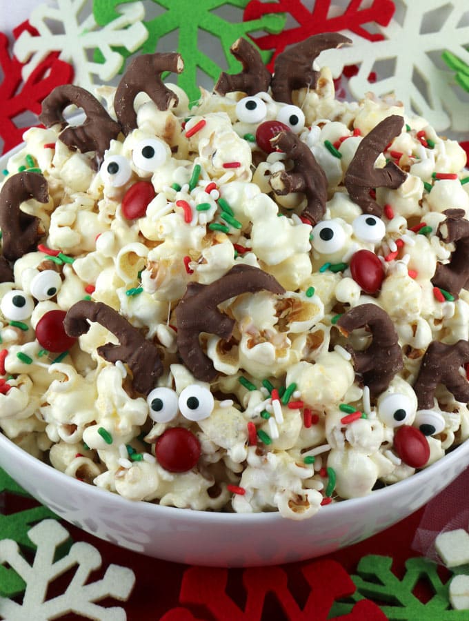 A popcorn mix with sprinkles, pretzels, and candy eyes. 