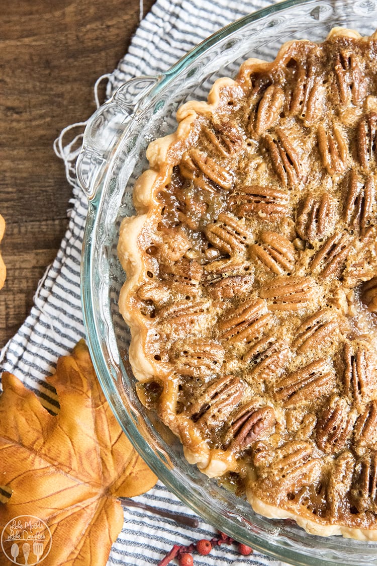 A buttery sugary pecan pie with crispy pecans