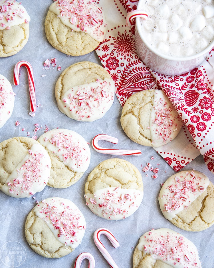 Sugar cookies dipped in white chocolate and peppermint candies