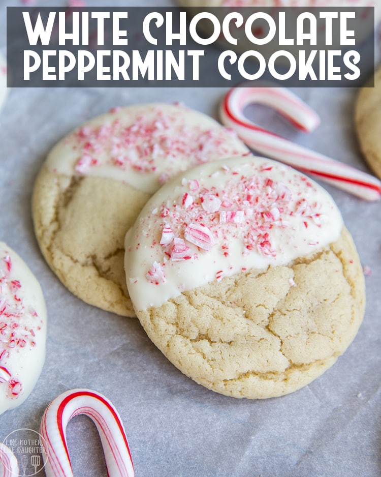 Sugar cookies half dipped in white chocolate and peppermint candy pieces. 