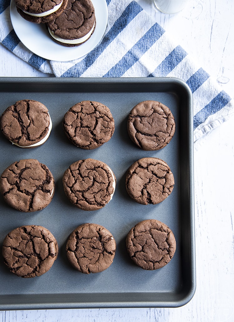 Homemade Oreos with cake mix cookies filled with cream cheese frosting