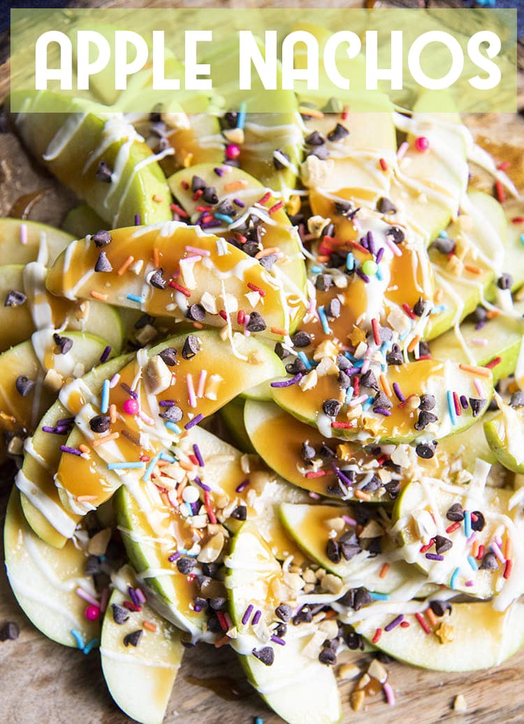 Close up image of apple nachos showing sliced apples with caramel and mini chocolate chips and sprinkles.