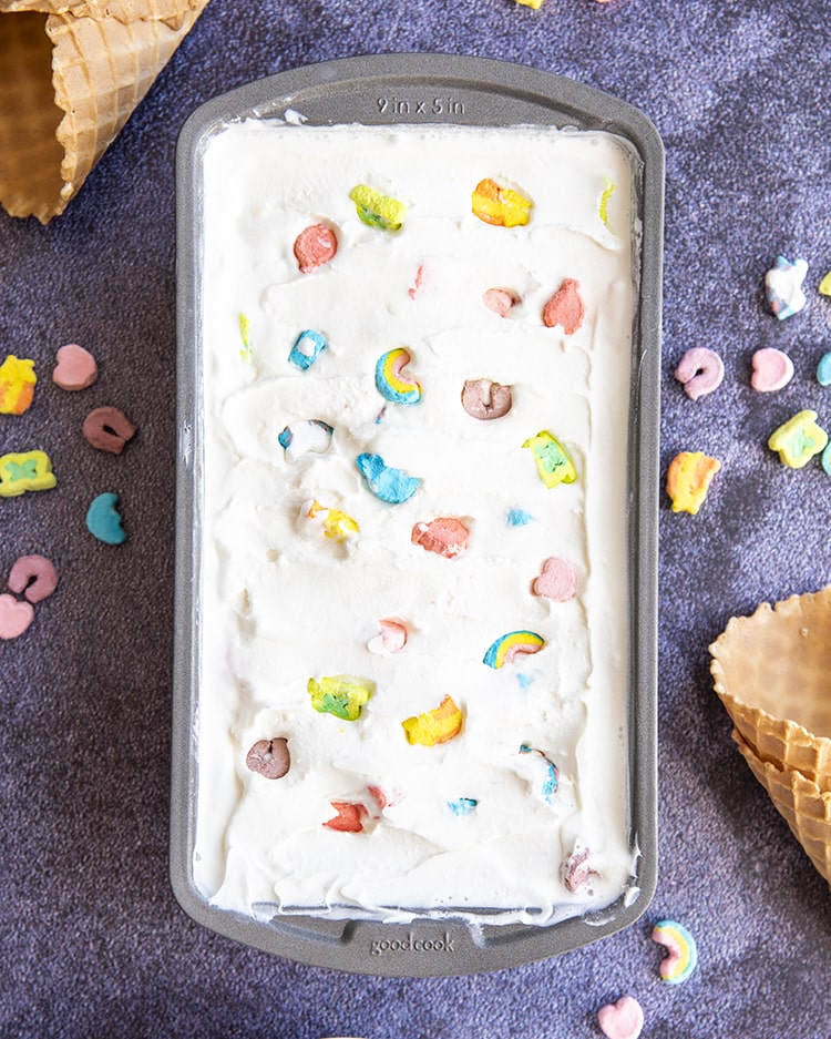 Above shot of lucky charms cereal milk ice cream frozen in a baking tin.