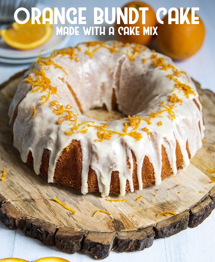 Above shot of orange bundt cake with orange zest and white frosting on a wood plate with title card