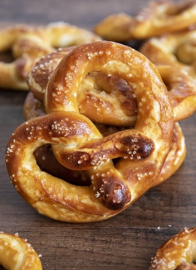 Close up image of soft pretzel with salt on top.