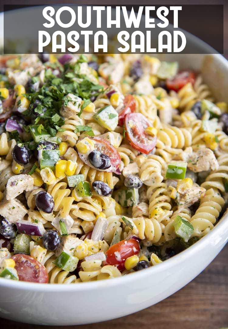 Close-up image of southwest pasta sald with pasts, corn, peppers, cilantro, and beans.