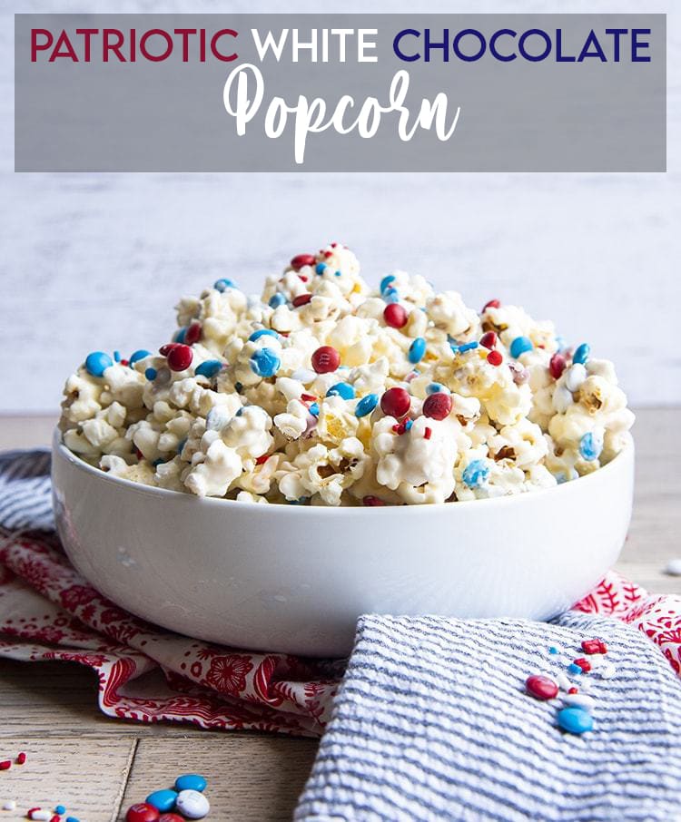 White Chocolate Popcorn with red and blue m&ms with text overlay for pinterest