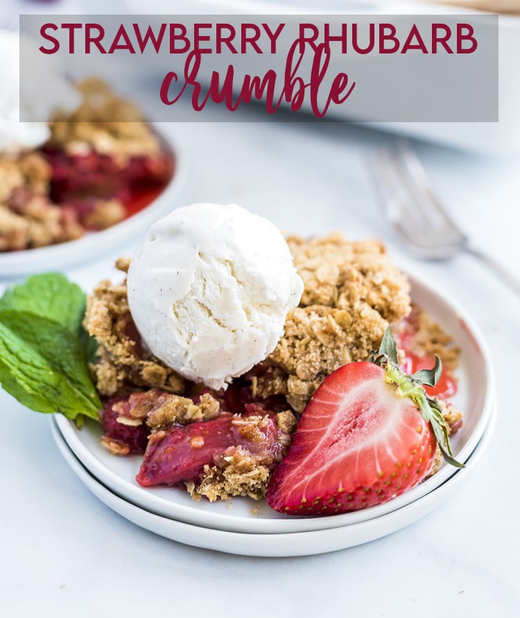 Strawberry Rhubarb Crumble topped with ice cream with text overlay for pinterest